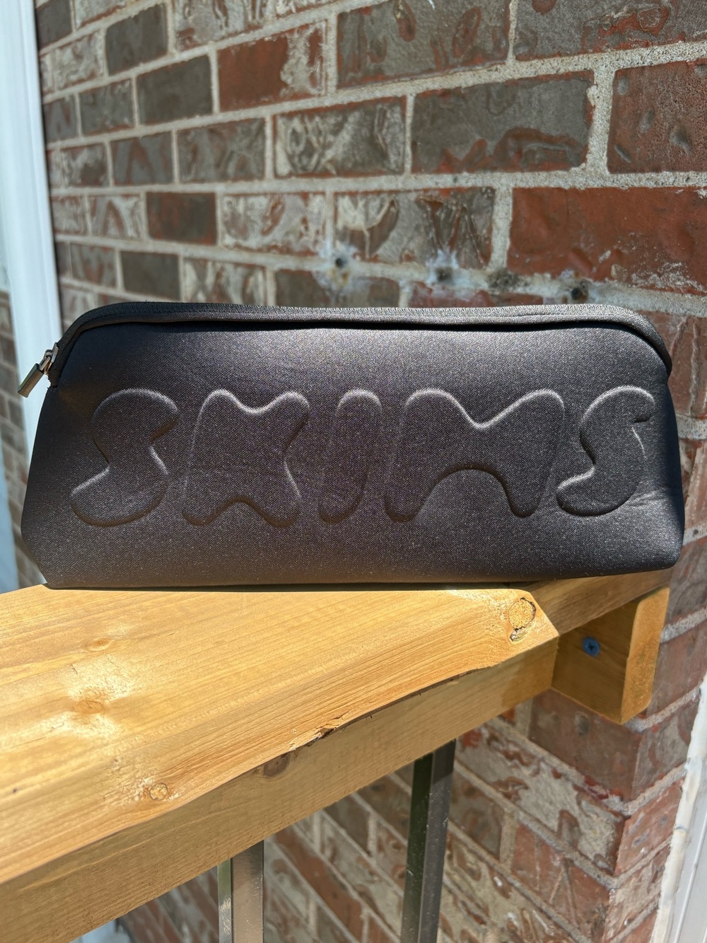 SKIMS Neoprene Clutch Case Zip Pouch In Black Onyx